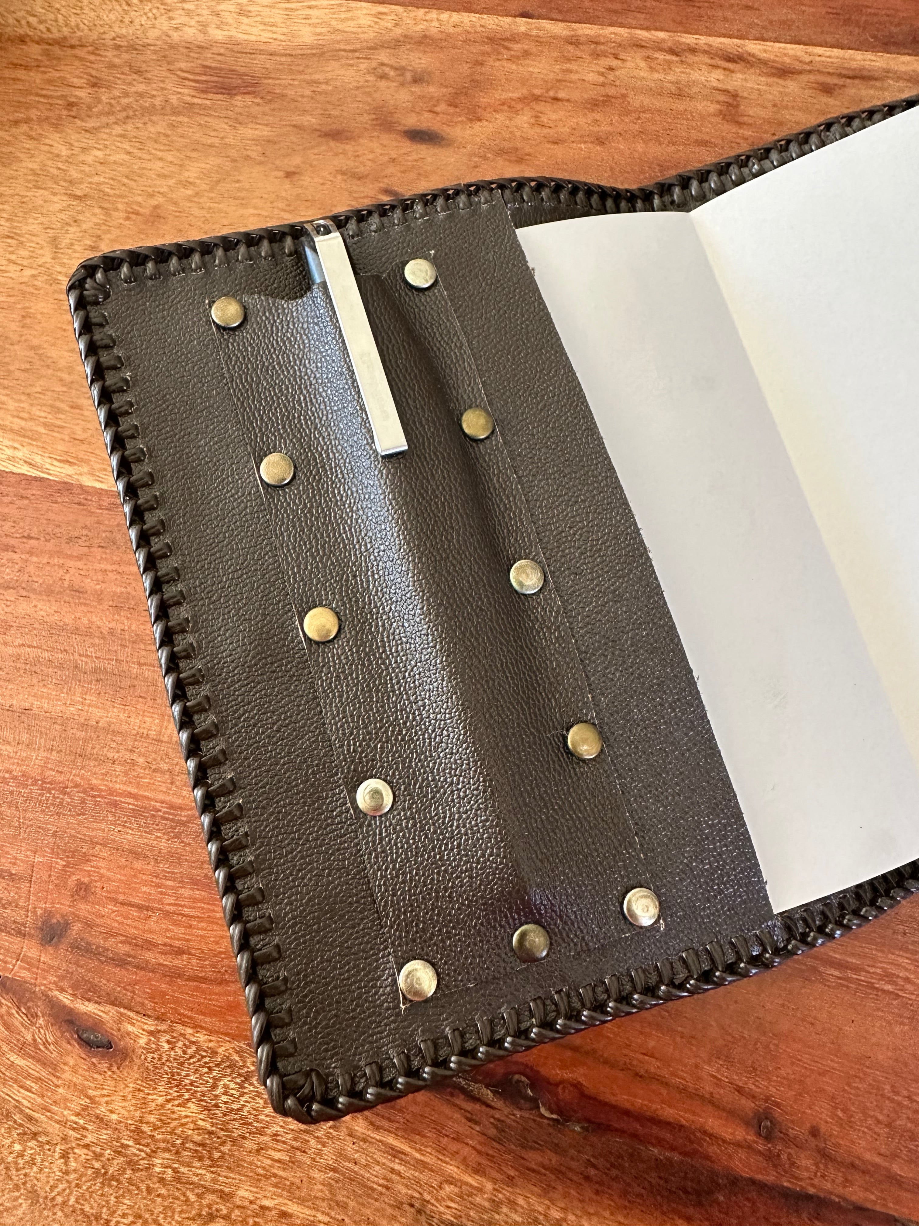 Hand tooled leather notebook cover