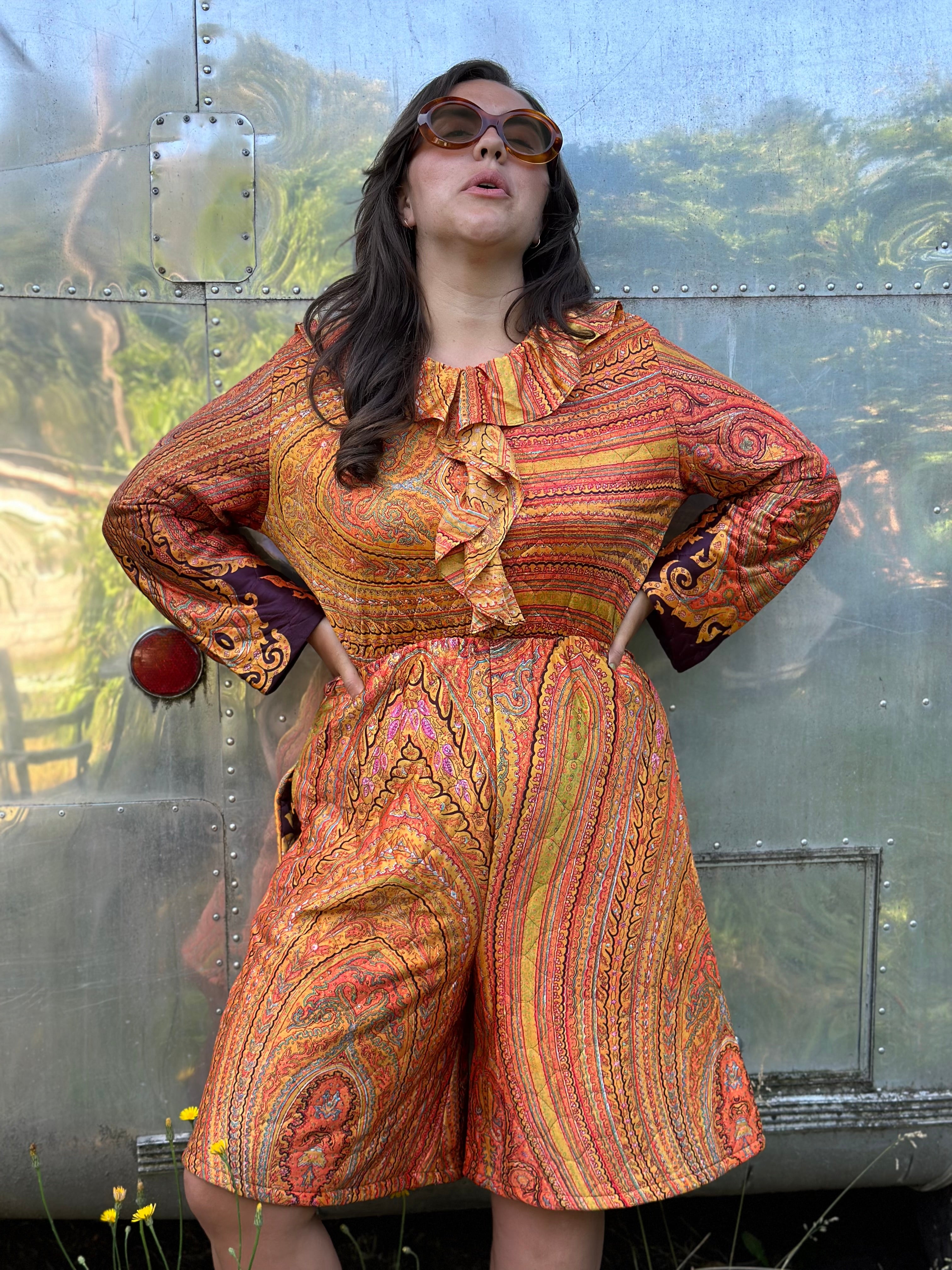 Orange quilted paisley playsuit with ruffle front