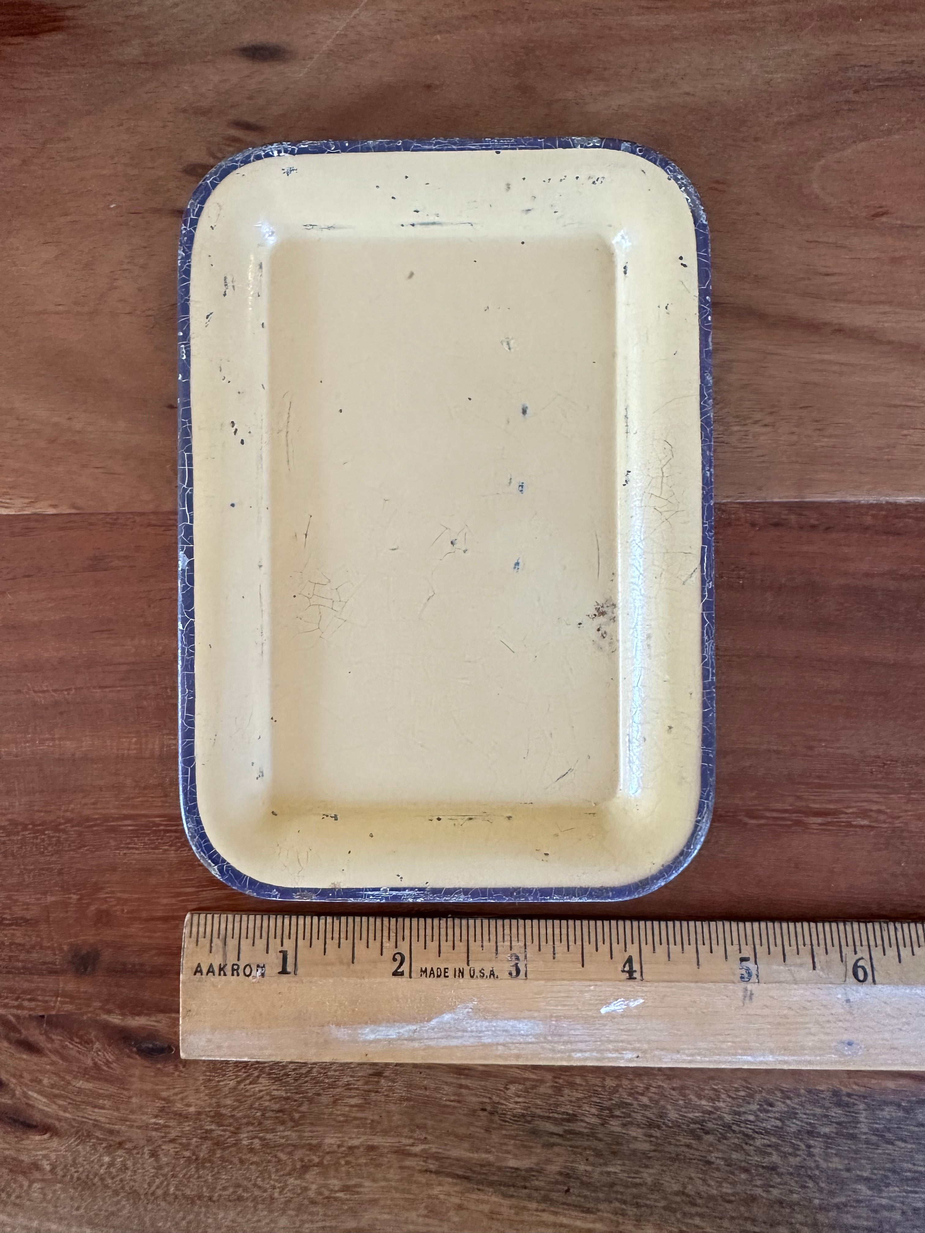 Small metal tray with crazing