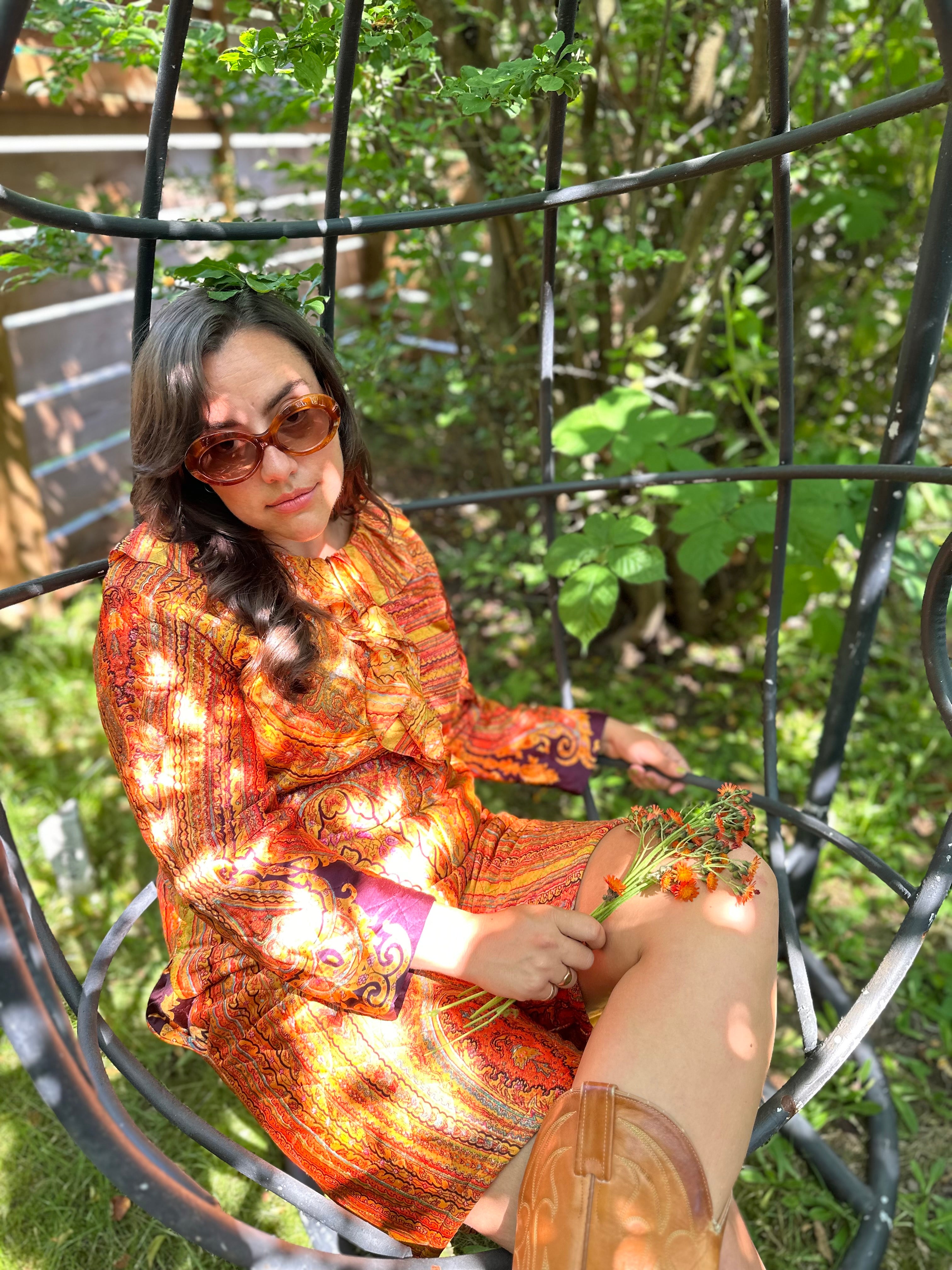 Orange quilted paisley playsuit with ruffle front