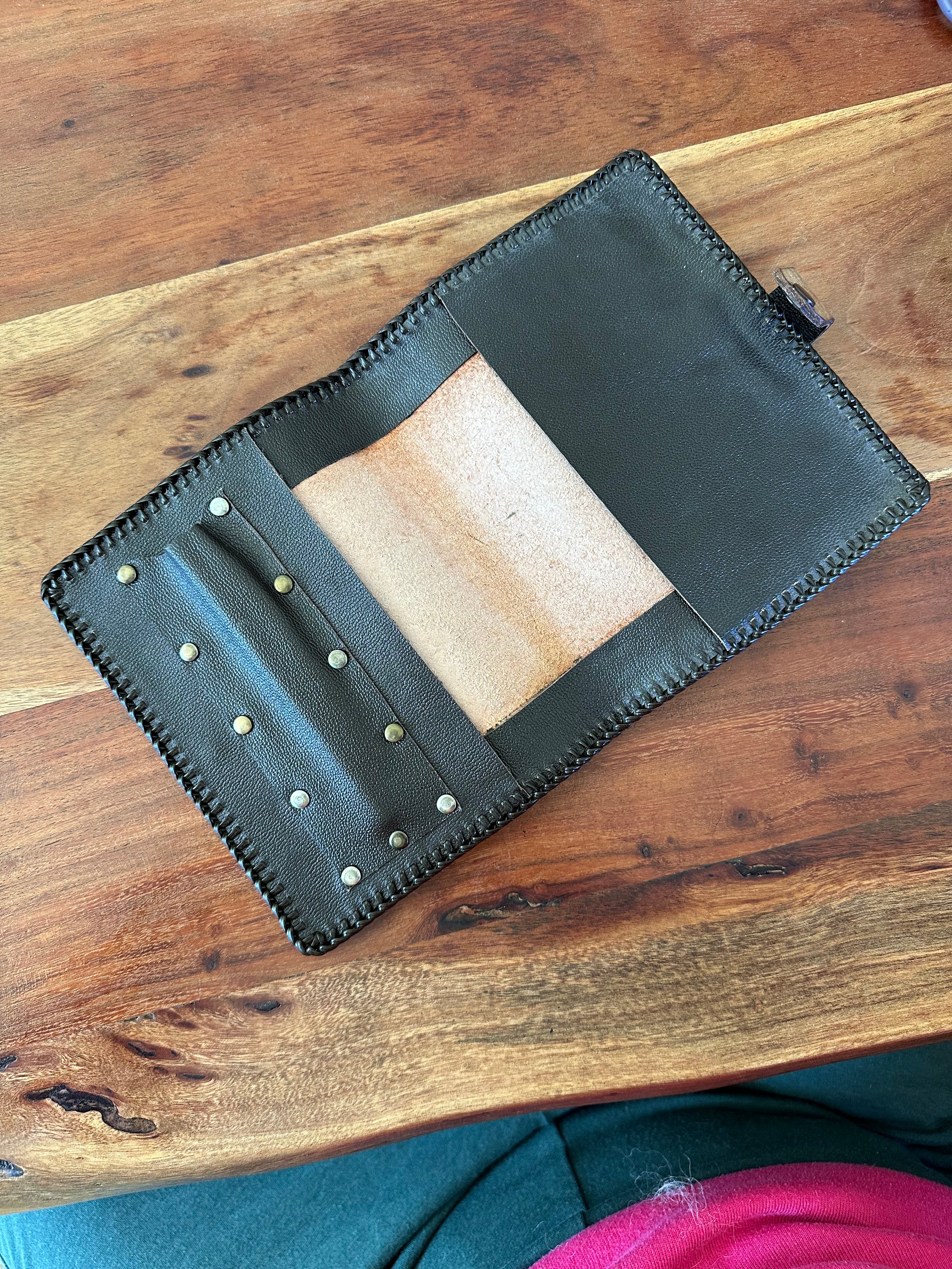 Hand tooled leather notebook cover