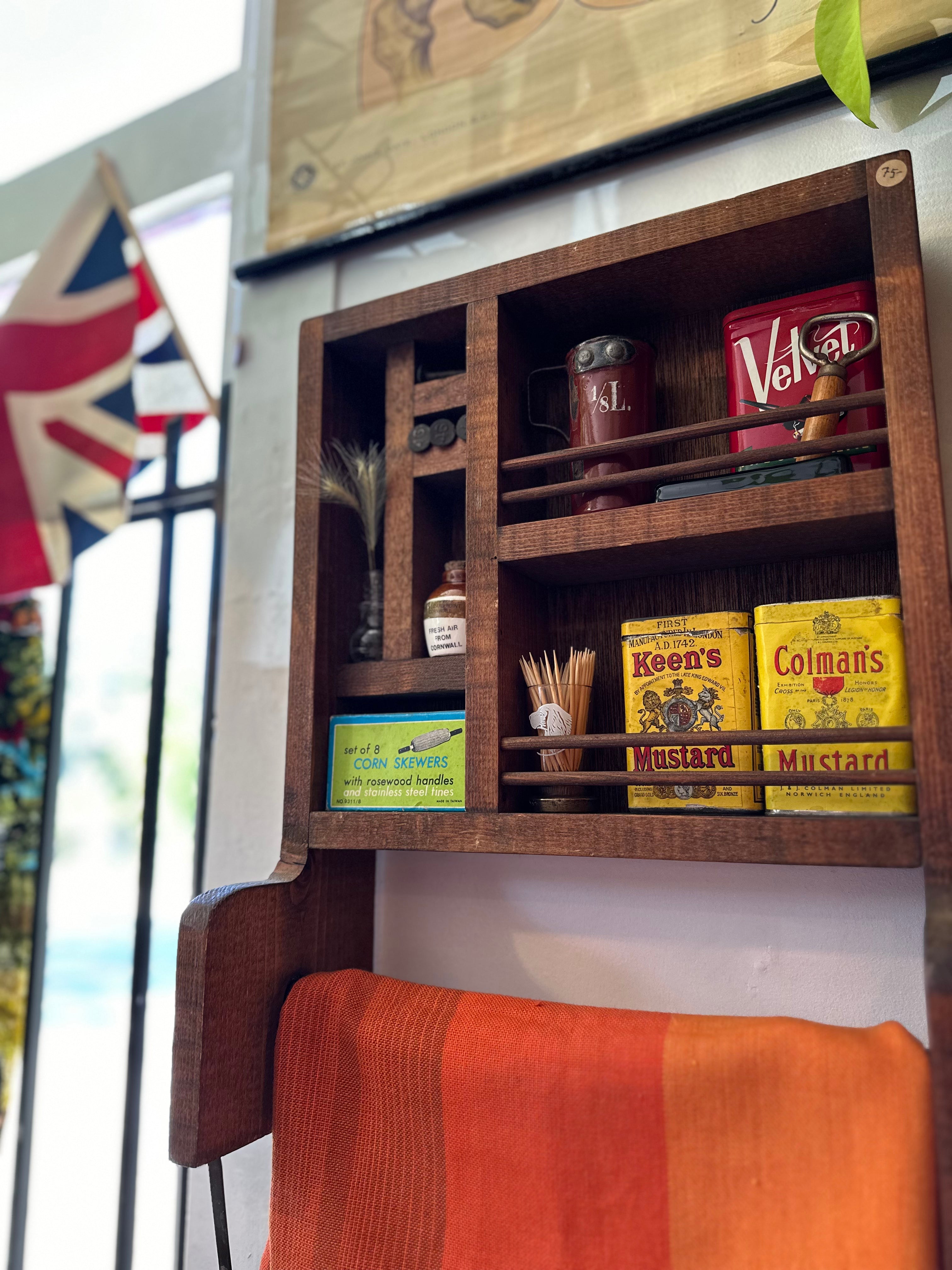 Handmade wooden shelf with hanging rail