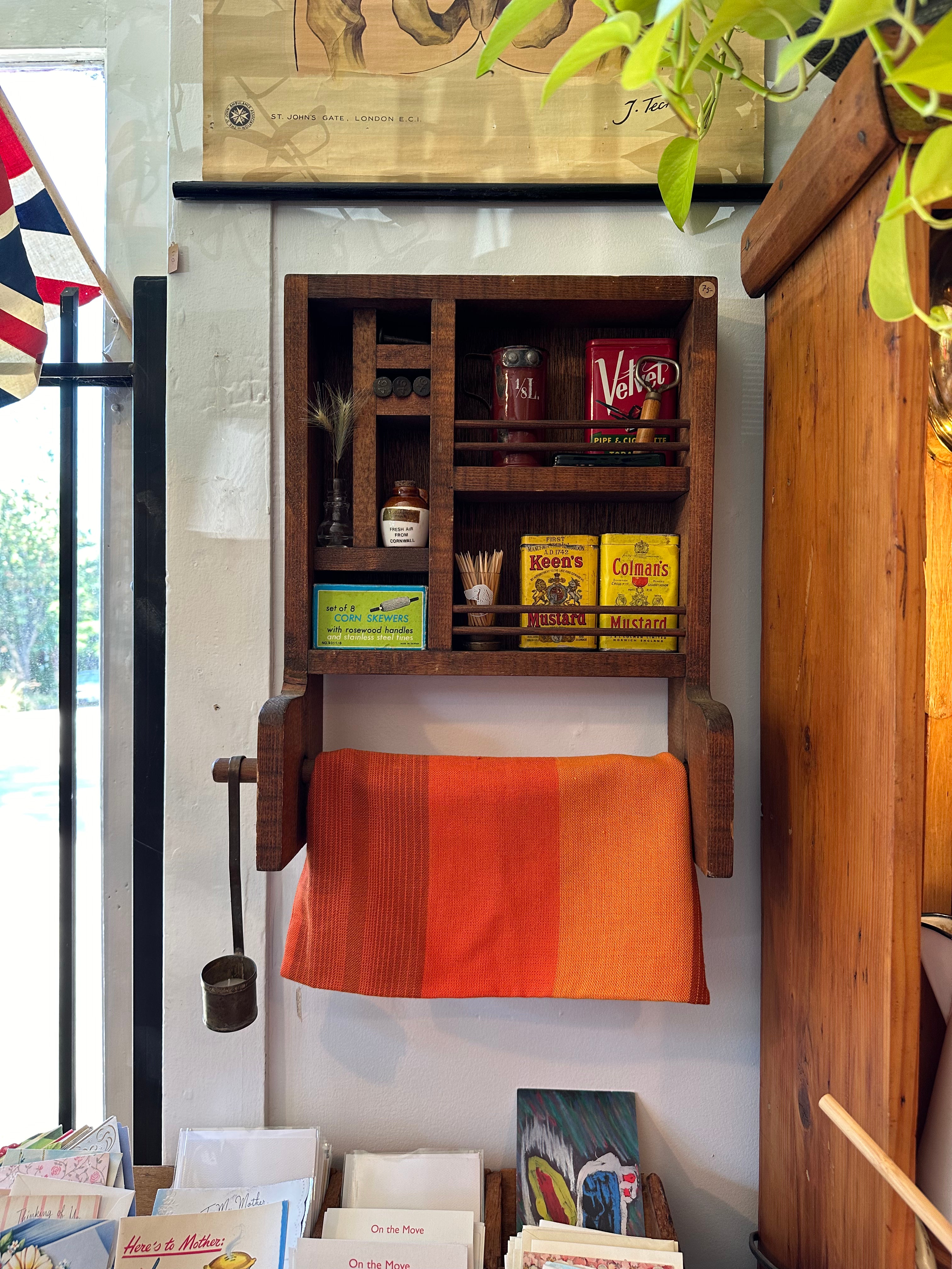 Handmade wooden shelf with hanging rail