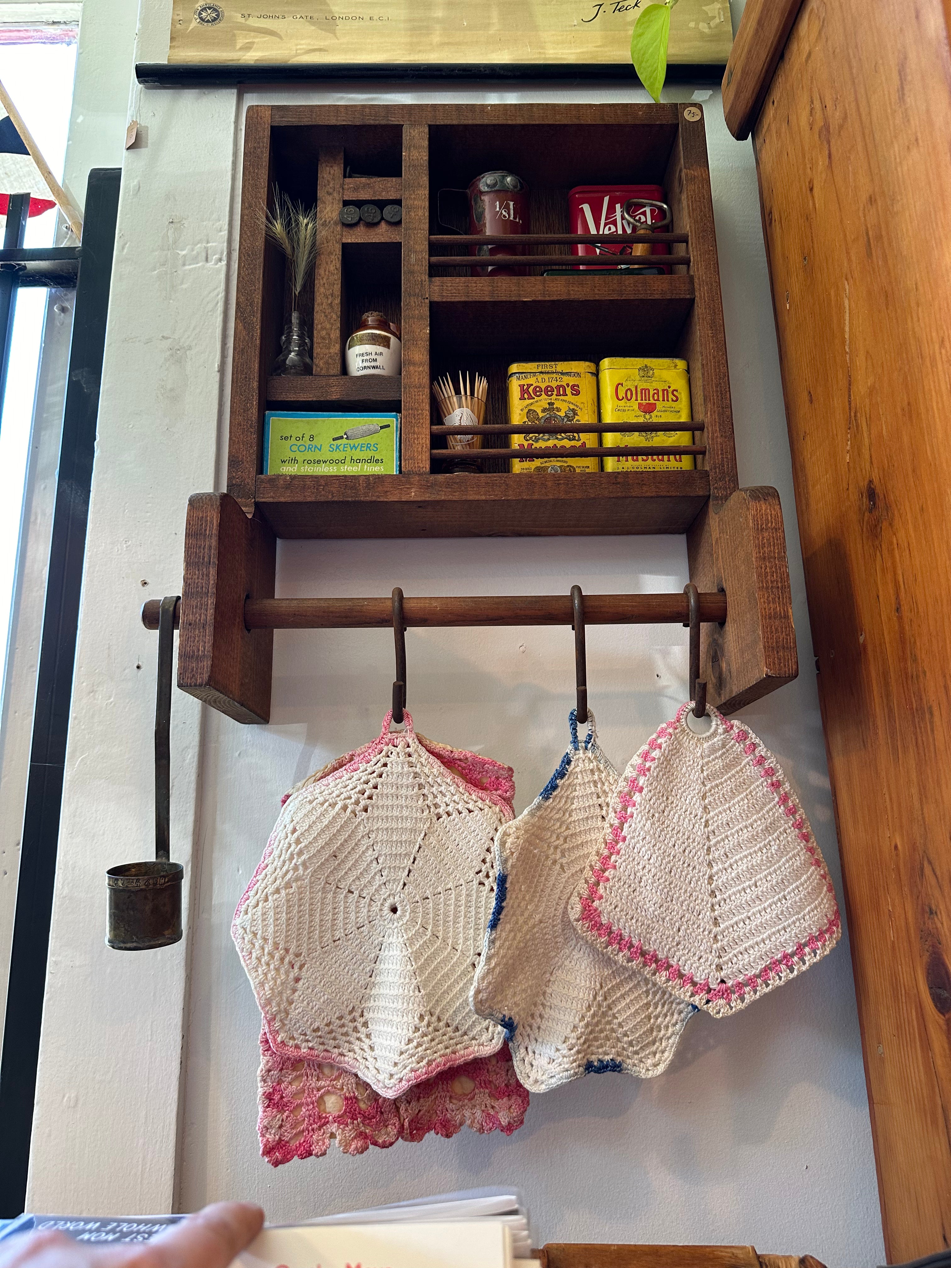 Handmade wooden shelf with hanging rail